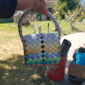Handcrafted purse with assorted colours.